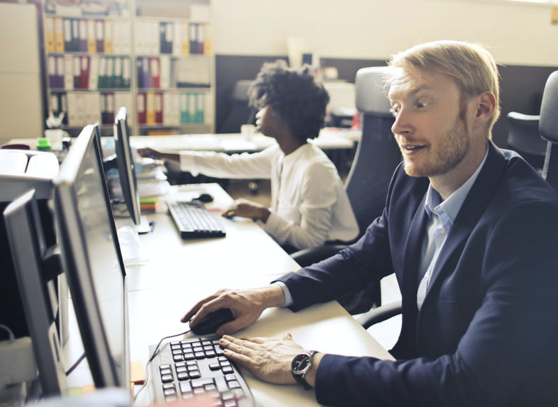 image of several workstation in office using ABC Accounts software